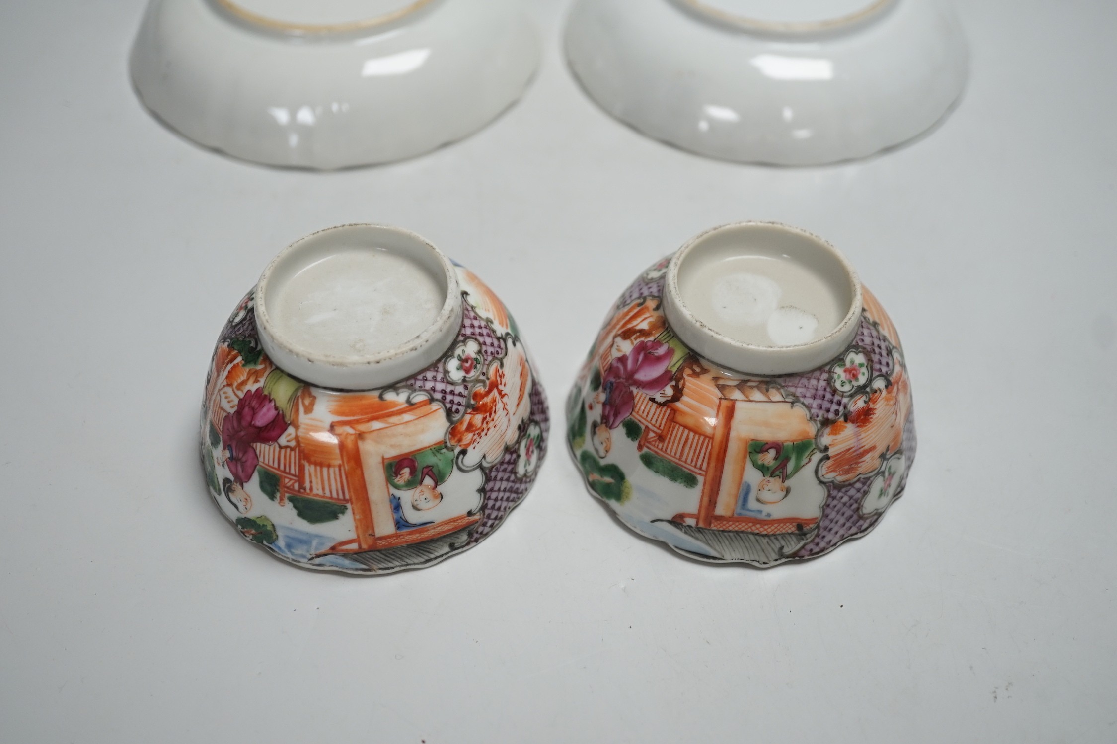 A pair of late 18th century Chinese export famille rose tea bowls and saucers. Saucers 13.5cm